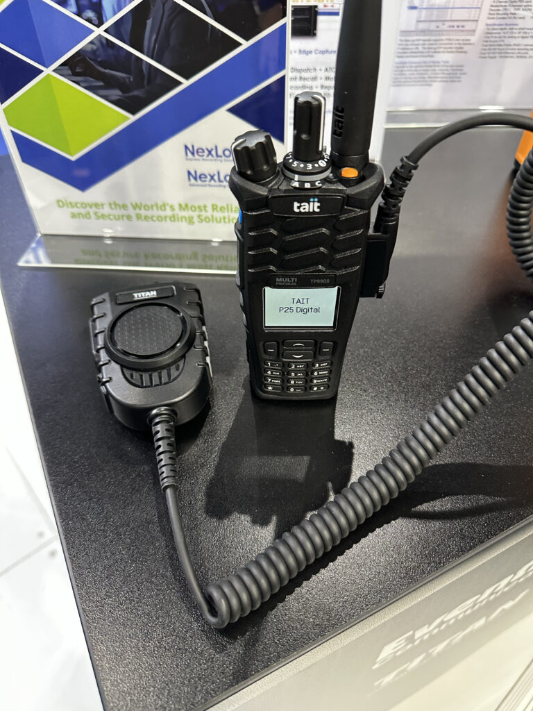 Display showing Titan RSM and Tait portable radio.